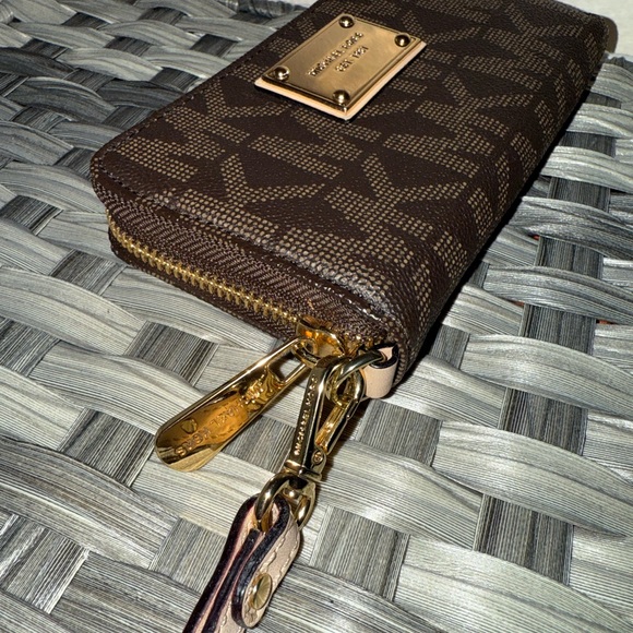 Michael Kors Handbags - NWOT Michael Kors Brown Logo Zip-Around Phone Wristlet Wallet with Gold Hardware
